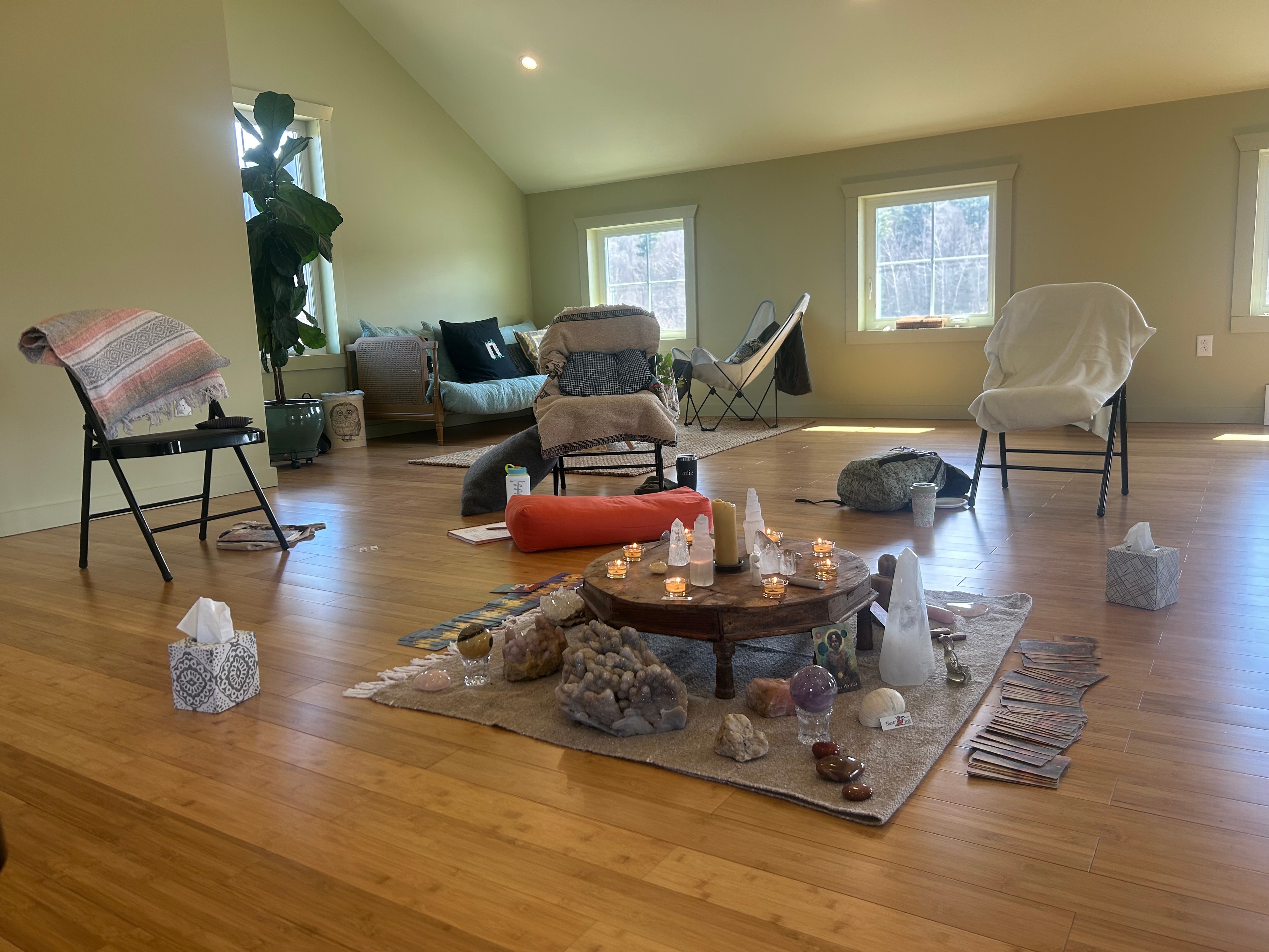 Event gathering with crystals and candles on altar